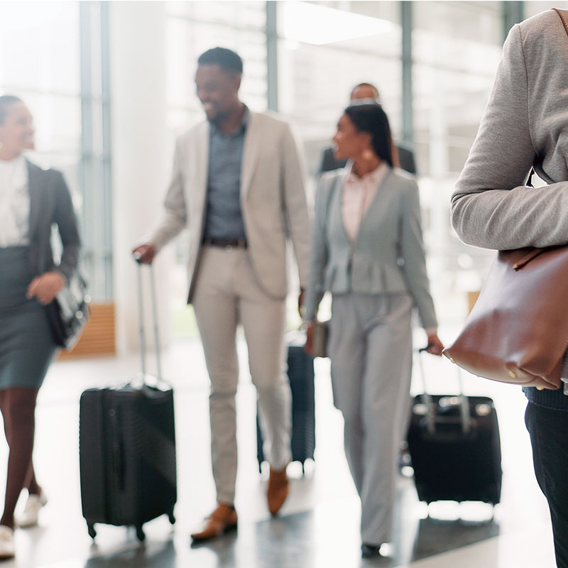 Air General Traveler concierge guiding group travel through airport efficiently